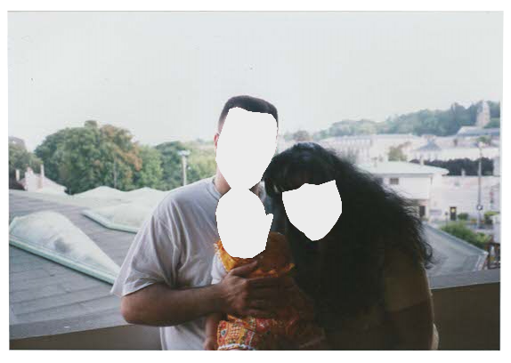 me and my parents on the balcony of our apartment (1997) author: my grandmother.